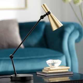 table with brass shade and lamp