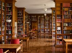 Fig 3: The library was well planned, with short shelves to prevent sagging. The spider-back chairs were a favourite Lutyens design. Campion Hall, University of Oxford. Photographed by Will Pryce for the Country Life Picture Library. ©Country Life