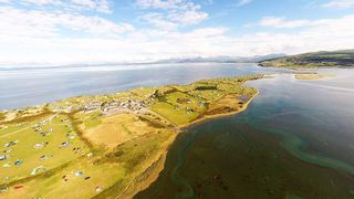 Campsites by the beach: aerial view of Shell Island, a coastal campsite in North Wales