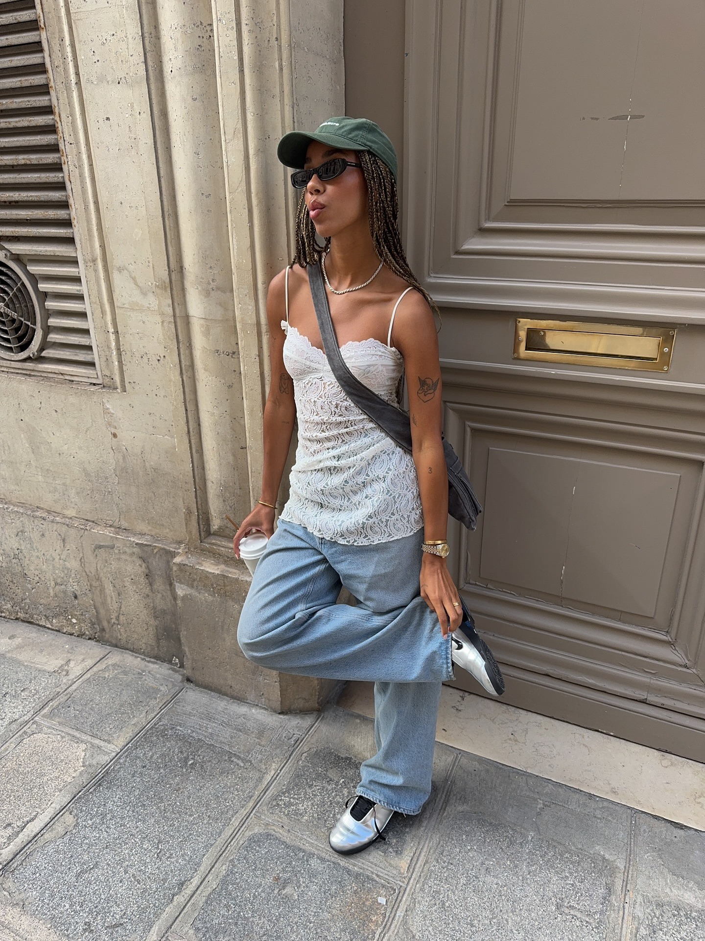 Woman in a lace top and relaxed jeans