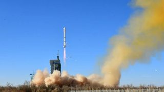 A Long March 2C rocket carrying MISRSAT-2 and two other satellites lifts off from Jiuquan Satellite Launch Center on Dec. 4, 2023 local time.