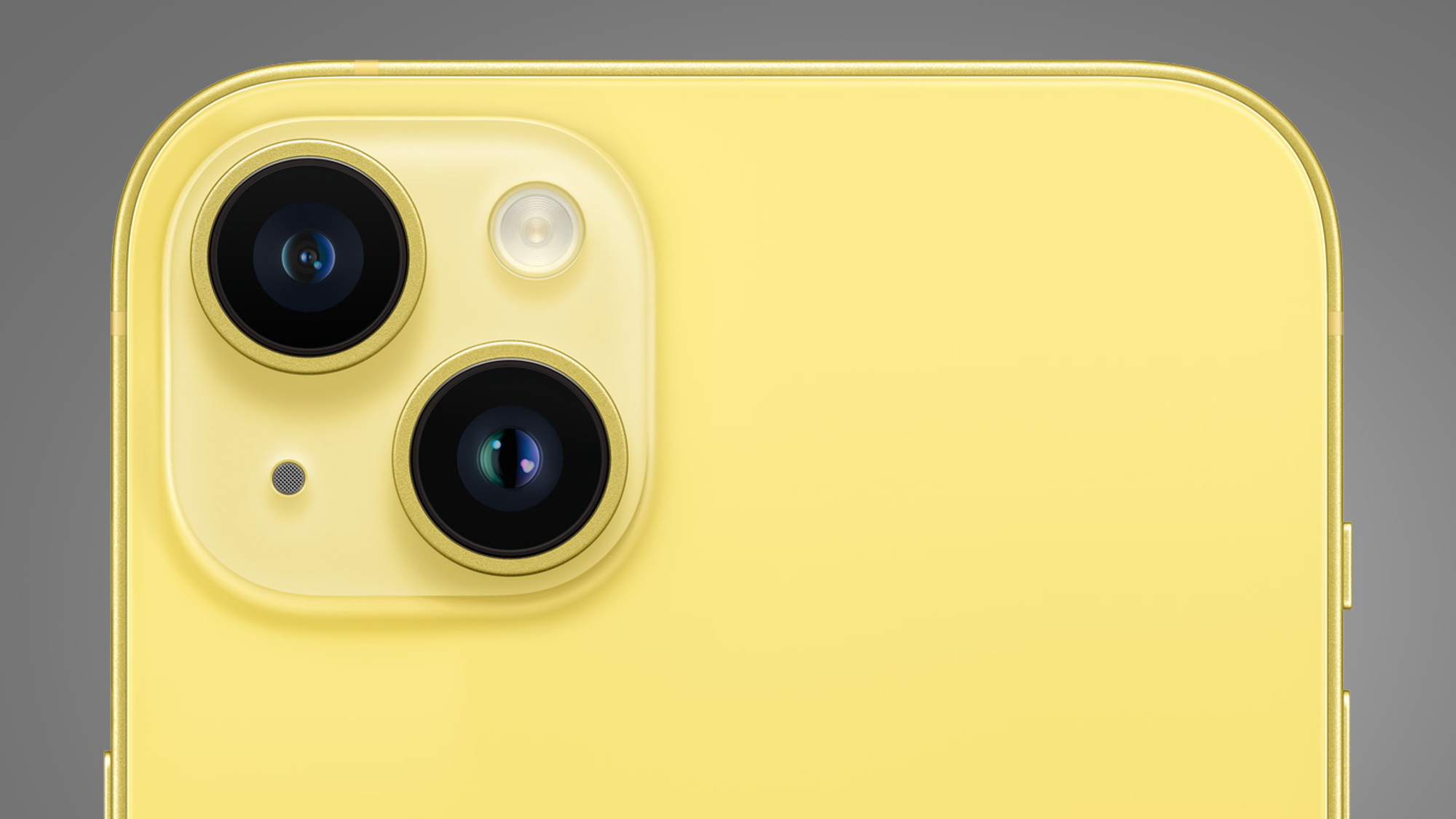 The yellow Apple iPhone 14 on a grey background