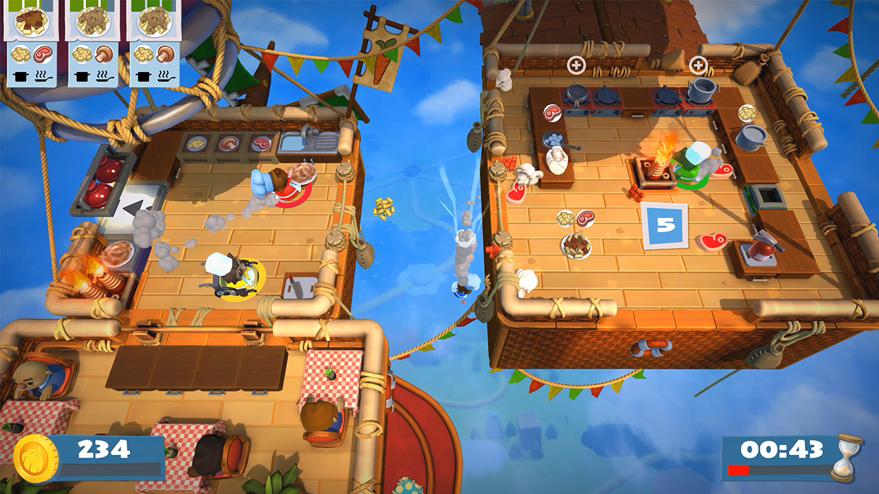 A kitchen working across two floating airships in Overcooked 2
