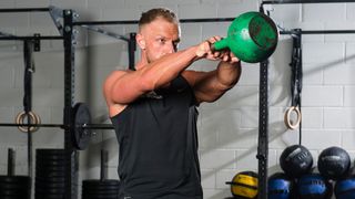 Mitch Lawrence performing the two-handed kettlebell swing