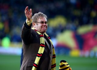 Elton John attends a Watford game against Wigan in 2014.