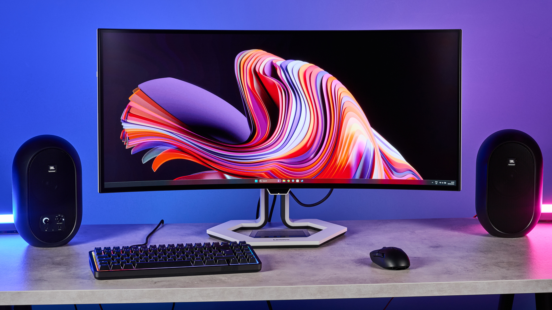 The Lenovo Legion Pro 34WD-10 as part of a gaming setup