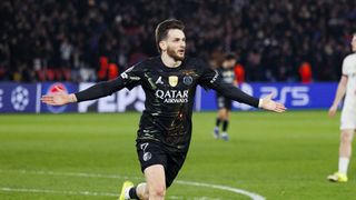 Khvicha Kvaratskhelia of Paris Saint-Germain scores the team's fifth goal during the UEFA Champions League 2025/26 Round of 16 First Leg match between Paris Saint-Germain FC and Chelsea FC at Parc des Princes on March 11, 2026 in Paris, France.