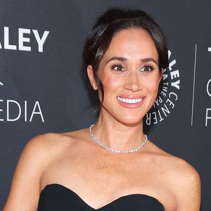 Meghan Markle wearing a diamond necklace