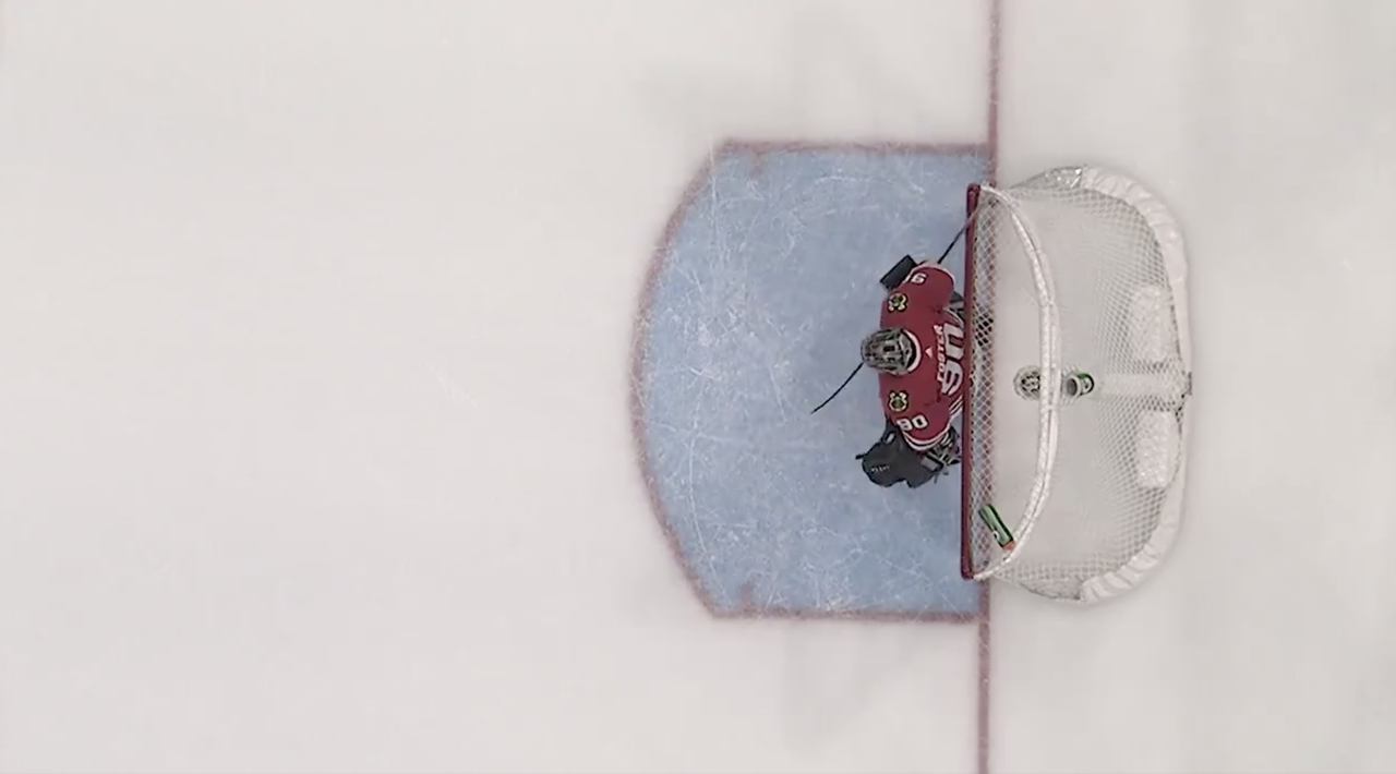 Accountant Scott Foster suits up as emergency goalie for the Chicago Blackhawks