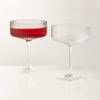 two clear coupe glasses