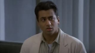 Lawrence Kutner (Kal Penn) listens to his colleagues on House