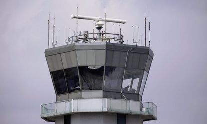 Texas Gov. Rick Perry is asking his state's transportation bureau to pay to keep its air-traffic controllers on the job.