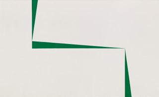 The exhibition includes Herrera’s Blanco y Verde series — sparse slivers of green against a white canvas, and the opposite, thin triangles of white against a green background.