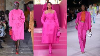 Models in fuchsia pink on the catwalk