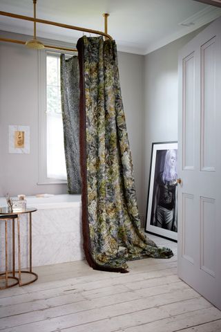 Grey bathroom with patterned shower curtain