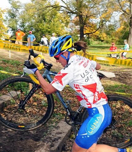 Katerina Nash (Luna Pro Team) running some steps at the front of the race.