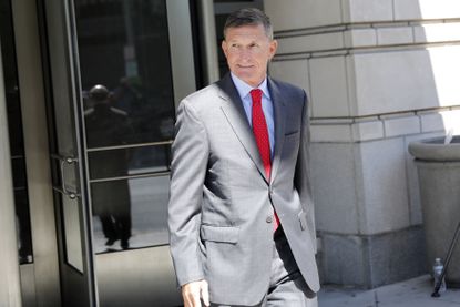 Michael Flynn leaves a courthouse