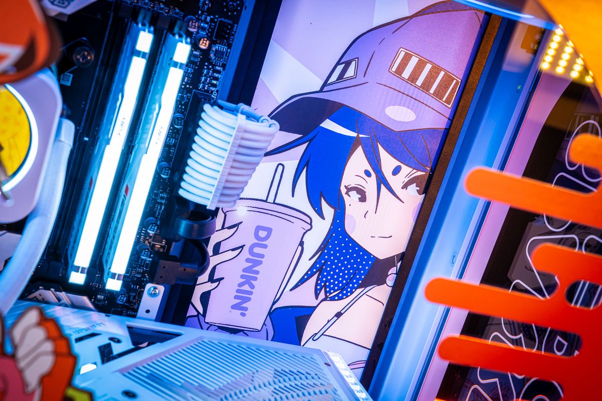 Dunkin's themed PC covered in anime girls.