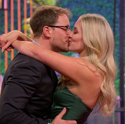 jeramey and laura kiss during their in-person reveal on 'love is blind' season 6