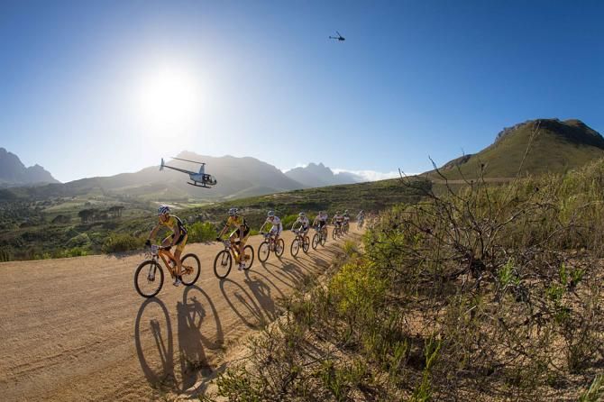 Christoph Sauser of Burry Stander-Songo leads the bunch out of Stellenbosch