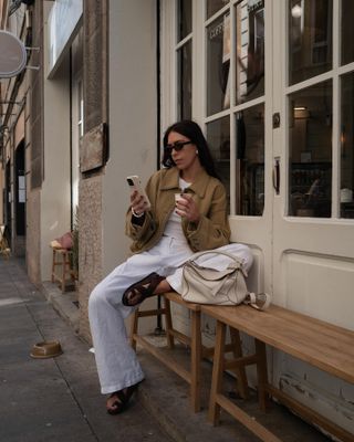Jessica Skye wearing A Emery sandals and linen trousers