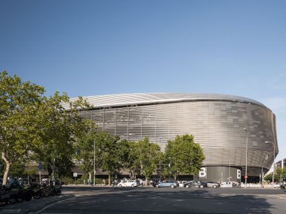 Santiago Bernabeu stadium with its curvy forms and shiny cladding