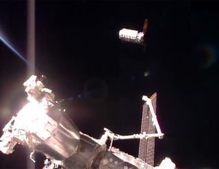 The Orbital ATK Cygnus cargo ship S.S. John Glenn arrives near the International Space Station on April 22, 2017 to deliver tons of supplies for the orbiting lab's crew.