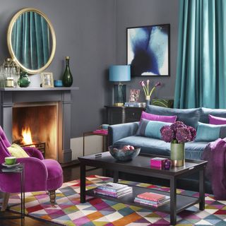 living room with fireplace and colourful furniture