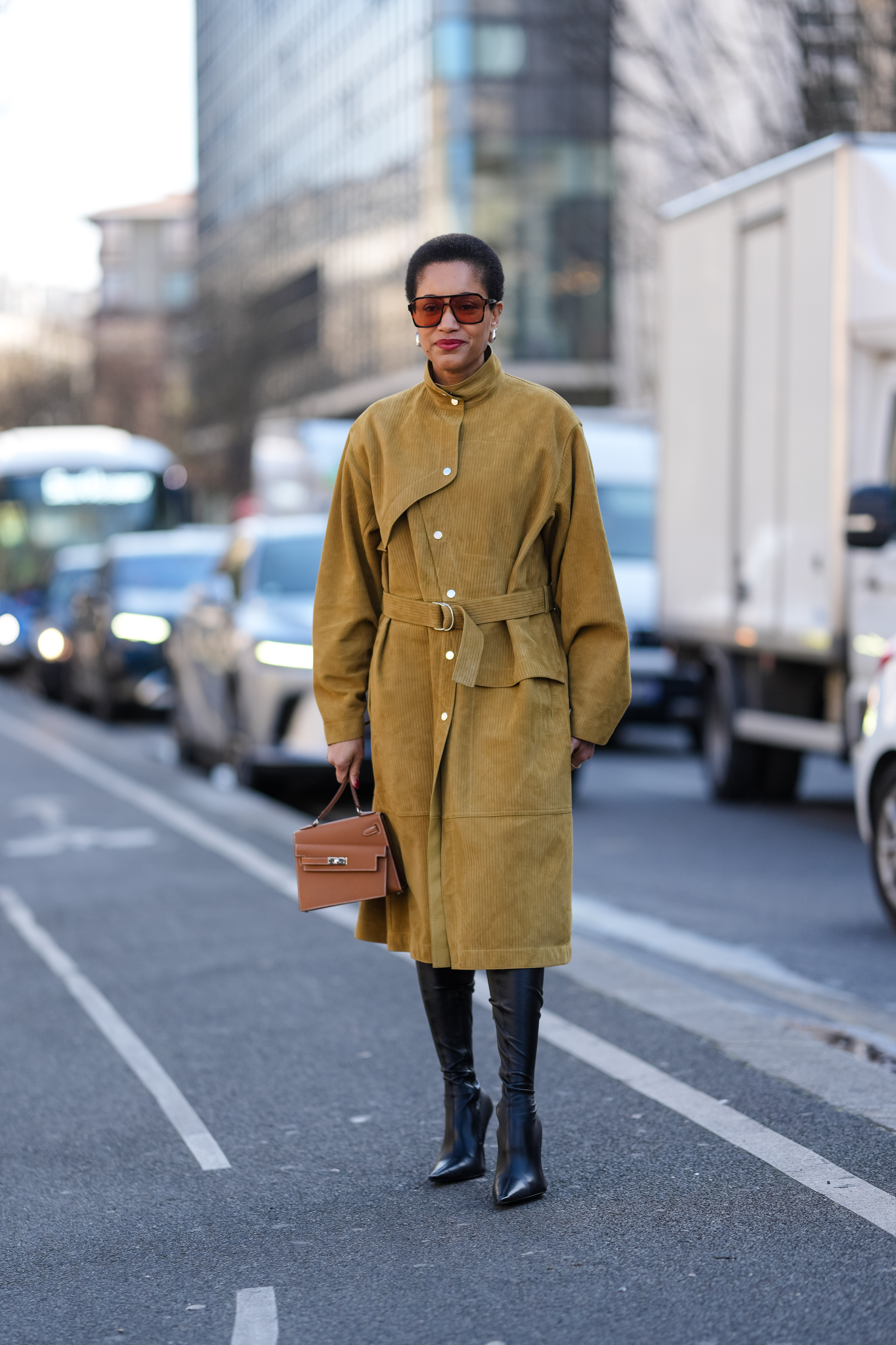 tamu mcpherson wears black pointy boots during fashion week