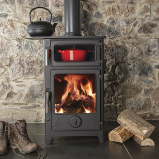 traditional woodburner with compact oven in black colour