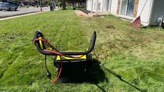 using the sun joe dethatcher on a front lawn