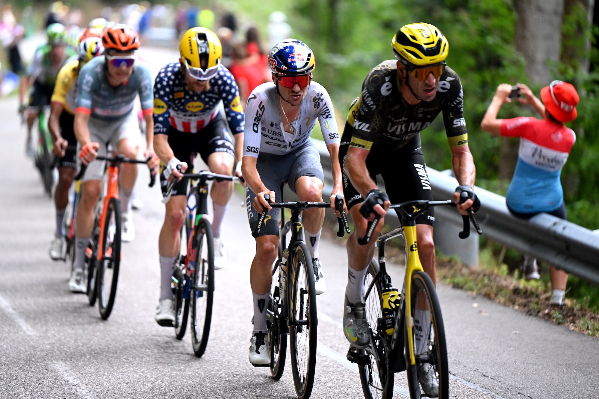Bruno Amirail (Visma-Lease a Bike) sets the pace in the chase group with Tom Pidcock (Pinarello-Q36.5) on his wheel