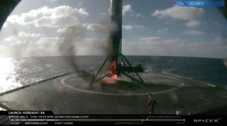 The first stage of a SpaceX Falcon 9 sits on the deck of the drone ship “Of Course I Still Love You” shortly after launching the Koreasat-5A satellite on Oct. 30, 2017.