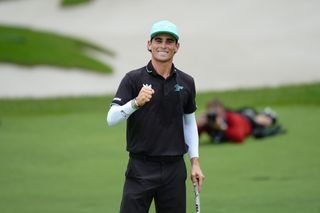 Joaquin Niemann fist pumps winning LIV Golf Singapore