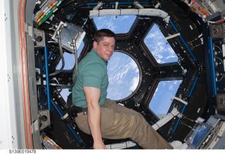Bob Behnken floating in the International Space Station during the STS-130 mission in February 2010.