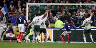 France’s William Gallas (second right) scores against Ireland following Thierry Henry's unseen handball