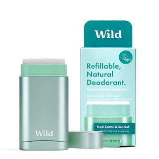 A metallic green-blue Wild refillable deodorant container