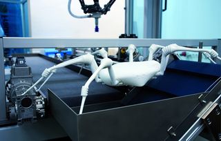 The robot spider's legs use elastic bellows drives as joints.