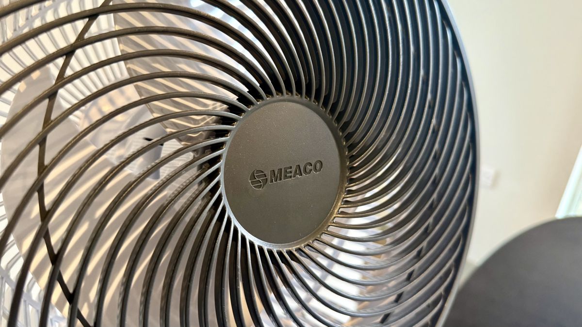 A close up of the MeacoFan Sefte Pro 10" Table Air Circulator pictured on a grey table