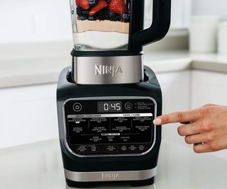 Ninja Foodi Heat iQ controls on a countertop