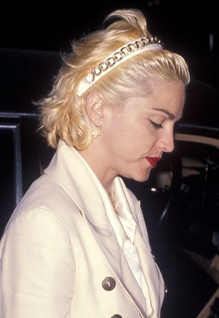 Madonna wearing a statement hairstyle as part of an embarrassing hair trends from the '90s round-up