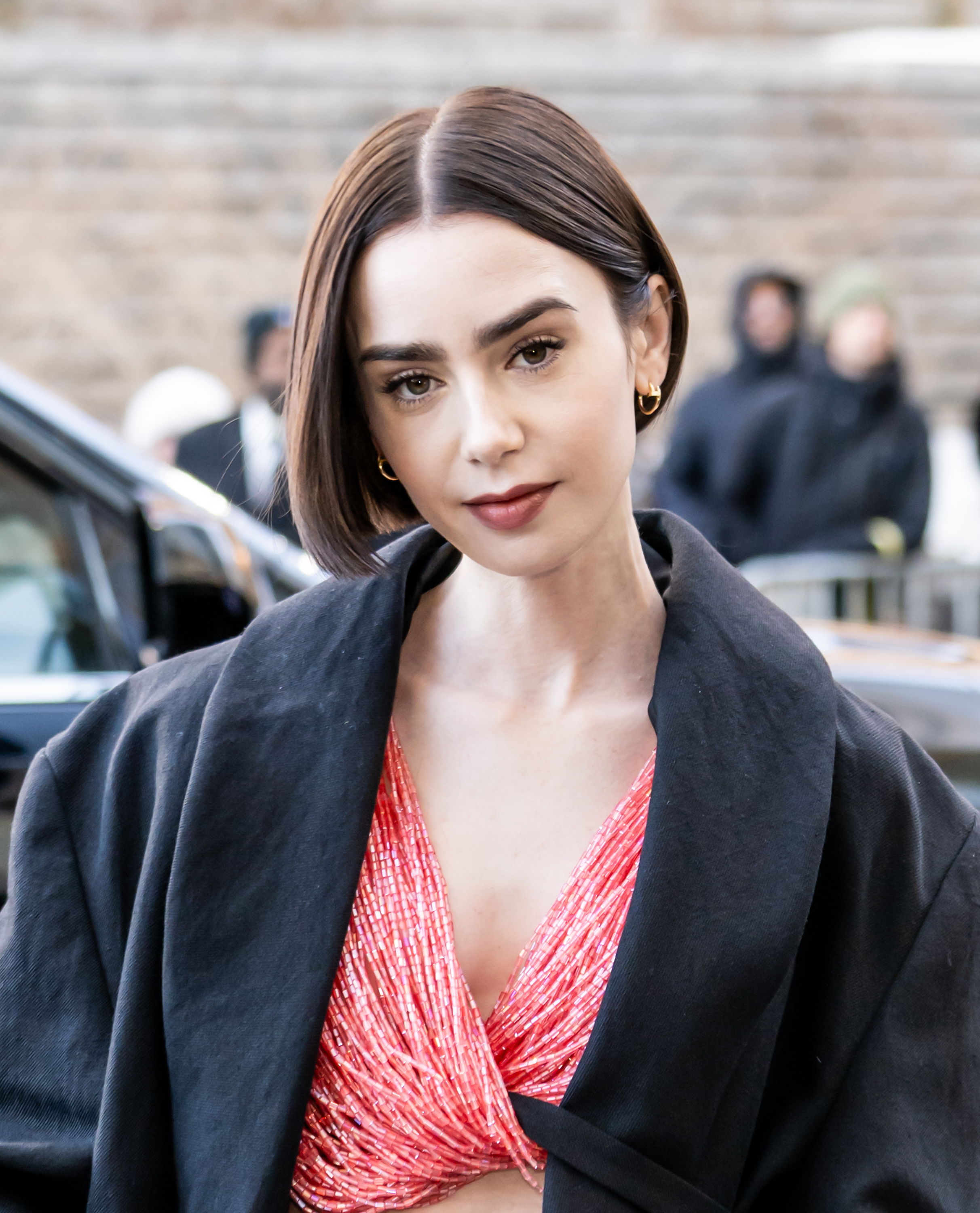 Actress Lily Collins attends the Calvin Klein fashion show during New York Fashion Week at the Shed in Hudson Yards on February 13, 2026 in New York City.