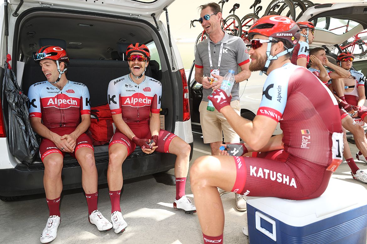 Katusha-Alpecin relax at the team car