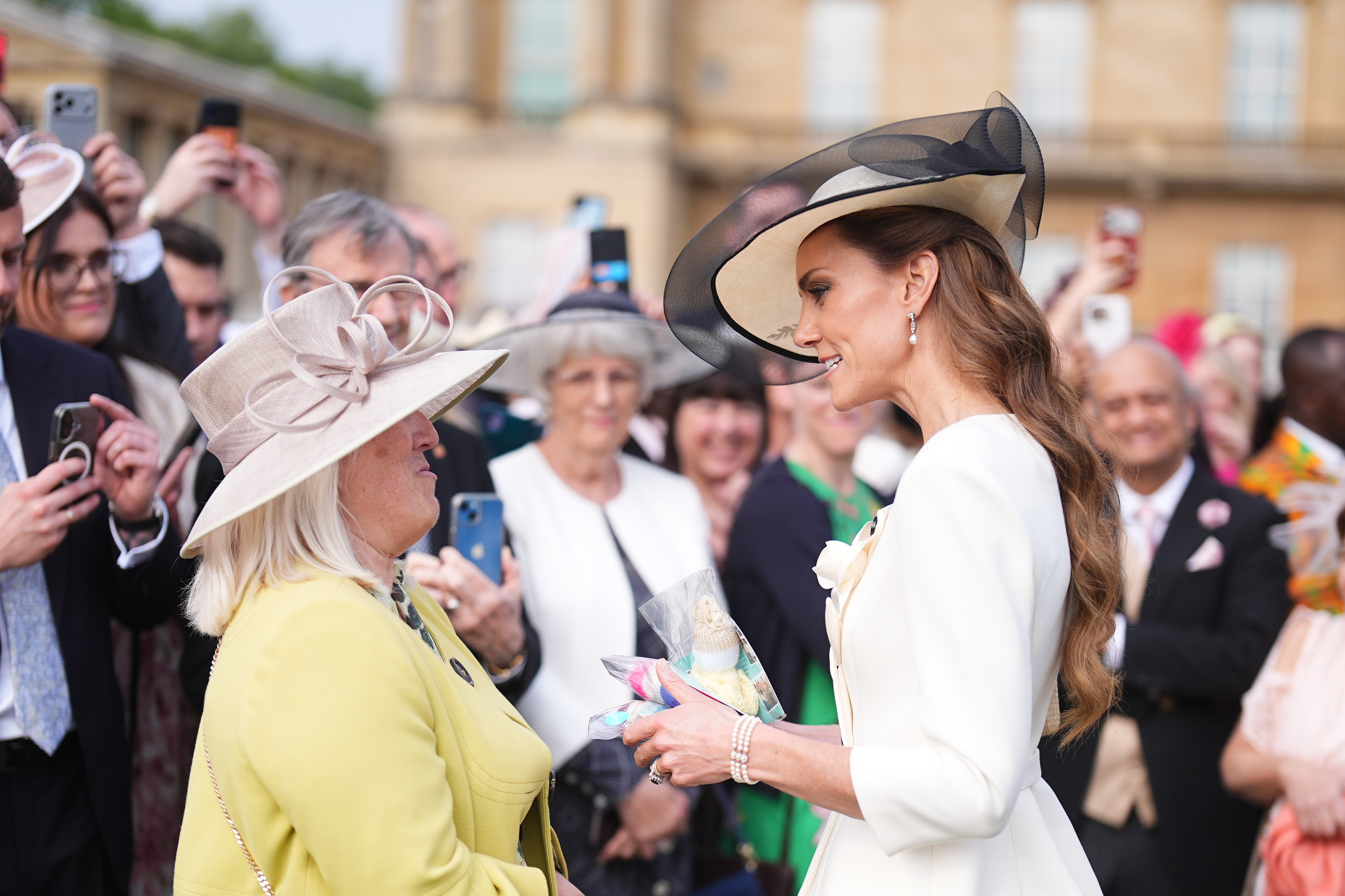 LONDON, ENGLAND - MAY 8: Catherine, Princess of Wales meets guests during a Royal Garden Party at Buckingham Palace on May 8, 2026 in London, England. (Photo by Aaron Chown - WPA Pool/Getty Images)