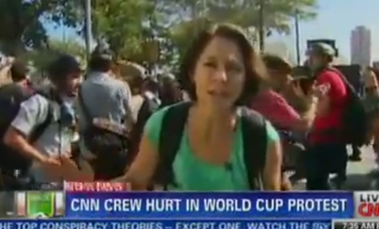 CNN crew struck by tear gas during live report of Sao Paulo protests
