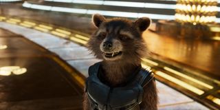 Rocket (Bradley Cooper) stealing some batteries in Guardians of the Galaxy Vol. 2
