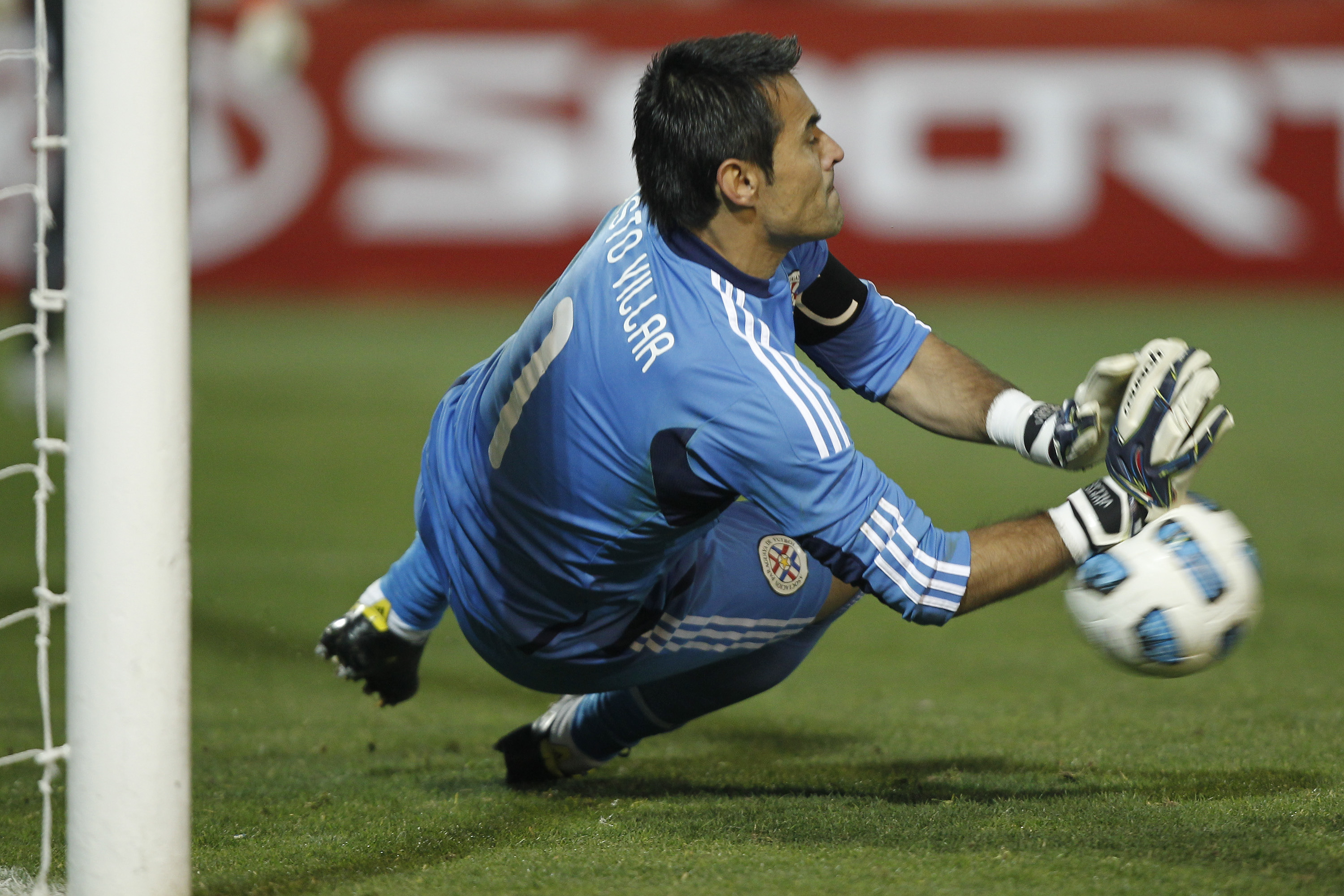 Paraguay's Justo Villar saves a penalty against Venezuela in the 2011 Copa America.