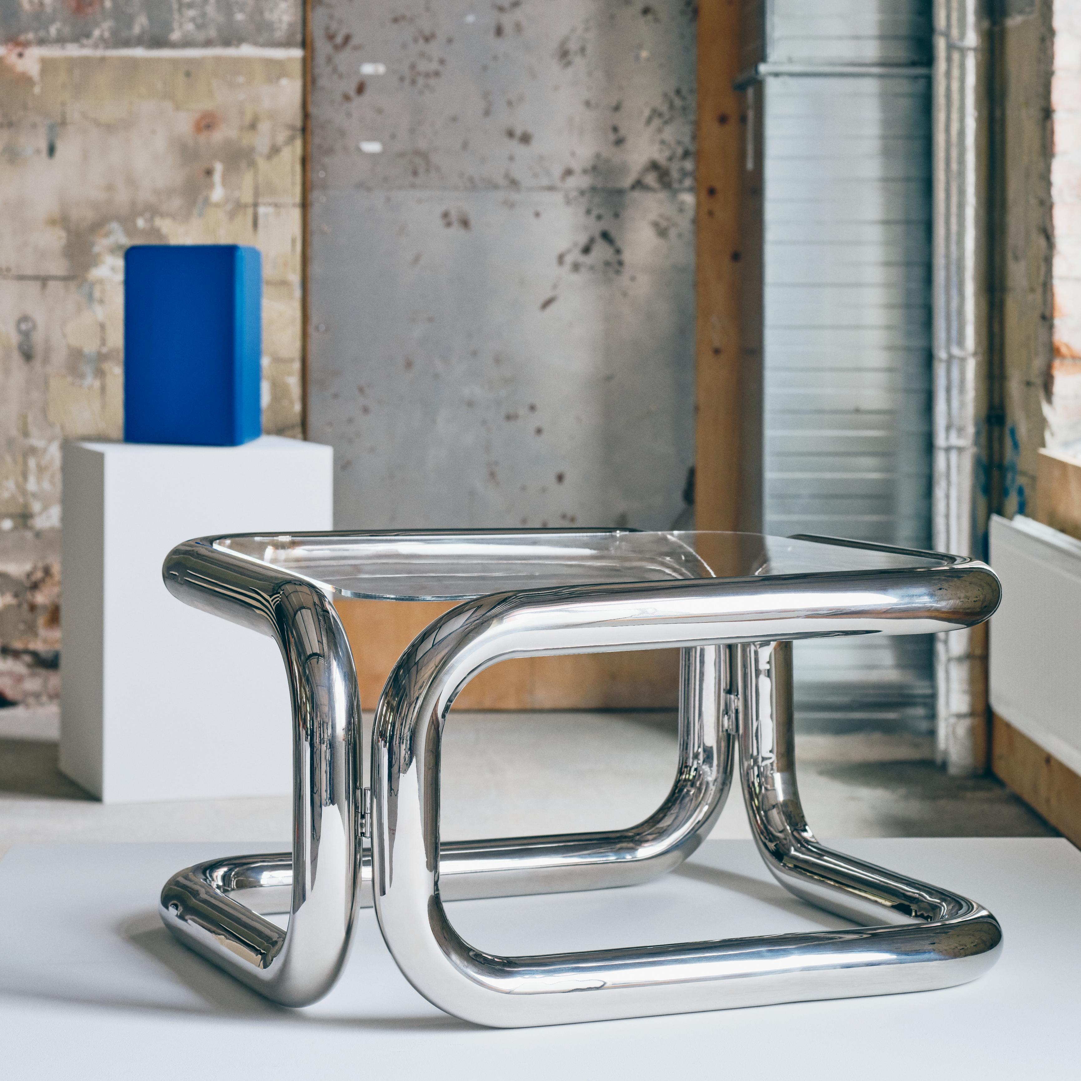 tubular steel and glass coffee table