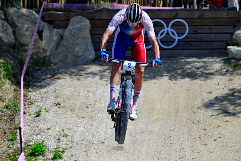 France's Victor Koretzky competes in the men's cross-country mountain biking event during the Paris 2024 Olympic Games in Elancourt Hill venue in Elancourt, on July 29, 2024. (Photo by John MACDOUGALL / AFP)