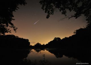 Stargazing photographer Jonathan S. McElvery captured this view of a Perseid meteor over Grafton, Mass., early on Aug. 12, 2013 during the peak of the 2013 Perseid meteor shower. He used a Nikon D700 camera equipped with a 14mm lens and set to ISO3200, 10 sec. @f/3.2